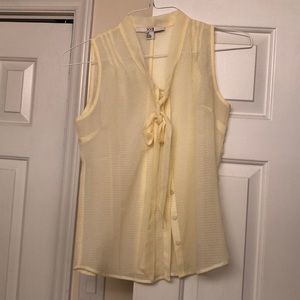 Sheer yellow blouse